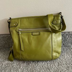 like green coach bag.